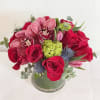 This Mega includes premium roses, thistles, burgundy or green color cymbidium orchid
