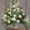 Tribute in White of love and remembrance. Creamy white roses, textured elements