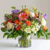 This premium floral arrangement sings a mesmerizing song of love and affection.