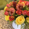Roses, Spray roses, Pum pums in a white ceramic vase. 