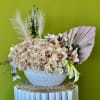 Quicksand roses, mini Calla Lilies, Spray roses, Orchids in a large white