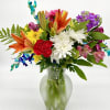 Celebrate the wide spectrum of colors in this arrangement, featuring a combination