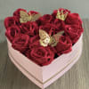 Presenting a captivating heart-shaped arrangement, perfect for the person you love. Displayed