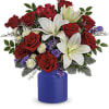 White asiatic lilies, red roses, red alstroemeria, white button spray chrysanthemums, purple
