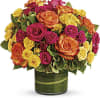 Bright green hydrangea and rich green salal leaves mix with hot pink
