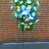 A good price and good value standing spray of flowers. Times are