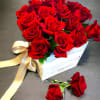 This eye-catching arrangement offers a modern twist on the classic dozen. Rustic