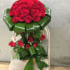 2 Dozen Red Roses arranged into one giant rose.