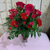 A romantic assortment of roses, spray roses and carnations will impress your