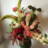 A beautiful and dramatic floral arrangement guaranteed to steal the show! A