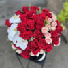 Enhance any space with our sophisticated flower arrangements in vases from Elegance