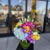 Enhance any space with our sophisticated flower arrangements in vases from Elegance