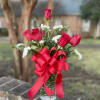Half Dozen Red Roses arranged in a vase with filler &amp; greenery.