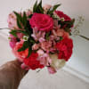 Beautiful cheerful bohemian style bouquet with hot pink standard and garden roses
