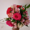 Beautiful cheerful bohemian style bouquet with hot pink standard and garden roses