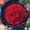 Luxury 100 Red Roses Bouquet &ndash; Black Wrap with Pearl Accents

Make a