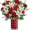 Elevate your Valentine&#039;s Day sentiments with this elegant rose and lily bouquet