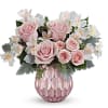Soft and sweet, this pastel pink rose bouquet gets the glam treatment