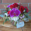 An arrangement that will make her heart melt! Top quality purple orchids
