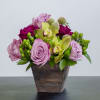 This is a simple rustic style arrangement with pops of class and