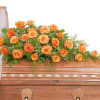 Orange Roses and select foliage make up this beautiful casket spray.
Approximately 24&quot;W