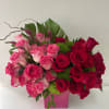 Designer arrangement roses in a unique box. 