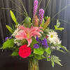 This gorgeous arrangement with lily, carnations, liatris, daisy, and static is sure