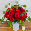 stunning arrangement of 18 vibrant red roses, expertly designed to capture the