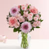 Budding romance or longtime love, this pink and lavender bouquet is hand-designed