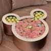 Micky Mouse-inspired face full of roses and ears filled with golden-wrapped Ferrero