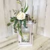 Approximately 14&quot;H x 5.5&quot;W. Wooden Lantern that reads &quot; Your presence we