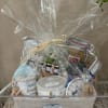 Our &quot;bee well&quot; gift basket contains a honey tea candle made of