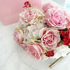 The &quot;Pink Roses Elegance Vase&quot; arrangement exudes a soft and romantic charm