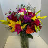 Our spring arrangement is a combination of flowers and colors that represent
