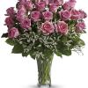 Blushing pink roses and delicate white limonium add up to a feminine