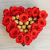 Heart Shape Red Roses with a Ferrero Rocher center, hand-arranged and delivered.
