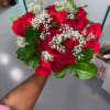 24 wrapped bouquet of roses. Color available upon request, call for availability