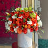Brighten any space with our Elegant Flower Box Arrangement! Bursting with vibrant