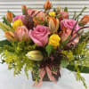 Bright flower arrangement made a perfect gift for any occasion.
