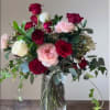 A timeless display of elegance and romance. This contemporary classic arrangement features