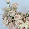 This casually elegant arrangement effortlessly blends into any space, making it an
