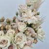 This casually elegant arrangement effortlessly blends into any space, making it an