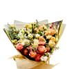 This elegant bouquet features a stunning combination of soft peach, cream, and