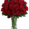 Sweep her off her feet with two dozen red roses in a