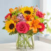 Like a warm embrace, our vibrant flower bouquet delivers your sentiments to