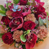 Indulge in the richness of deep red and blush tones with our