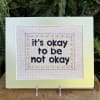 Hand cross-stitched quote matted and ready for framing. Approximately 10  inches