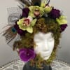 A unique kind of floral arrangement, unlike any other. Adorned in orchids