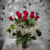 &quot;Hugs and Roses&quot; is a classic and heartfelt arrangement that brings together