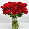 Crimson Devotion is an extraordinary floral arrangement featuring 50 lush red roses